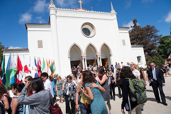 people in front of Sacred Heart Chapel after mass