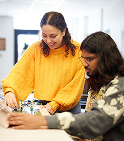 two students in a lab