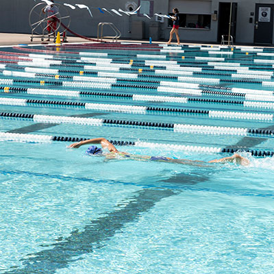 student swimming in the pool