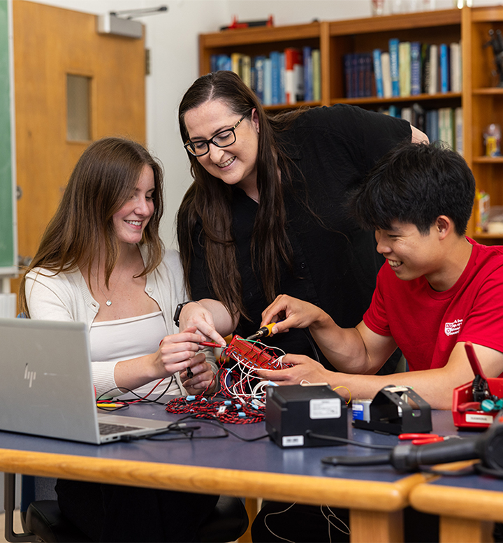 LMU Assistant Professor of Physics Emily Hawkins in the classroom with students