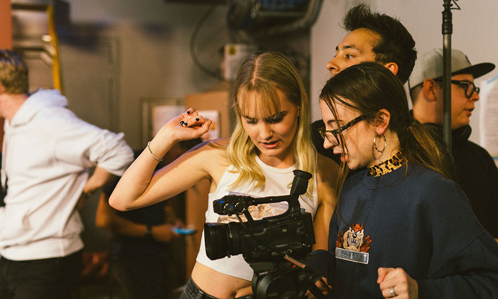 Production 101 students learning camera